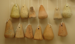 Loom weights 430-200 BC - source Kerameikos Museum